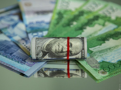 Тенге укрепился на бирже до 458,6 за доллар