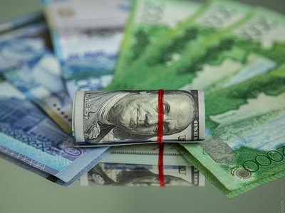 Курс доллара на бирже снизился до 445,5 тенге