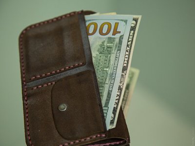 Курс доллара на бирже снизился до 448,2 тенге