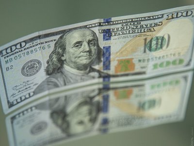 Доллар торгуется на бирже по 448,6 тенге