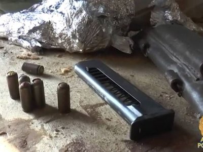 Оружие, боеприпасы и наркотики нашли в доме 44-летнего алматинца