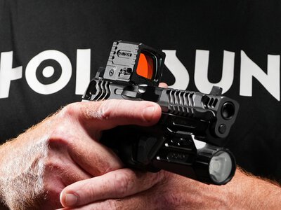 Эволюция коллиматорной оптики на примере Holosun