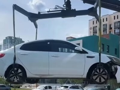  Брошенные автомобили убирают с улиц и дворов Астаны 
