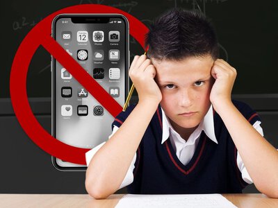 В школах одной из областей могут запретить мобильные телефоны
