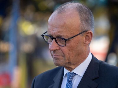 Во время визита в Киев Мерц обратился к Путину